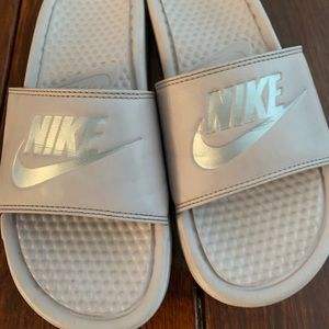 Women’s rose/silver benassi Nike slides